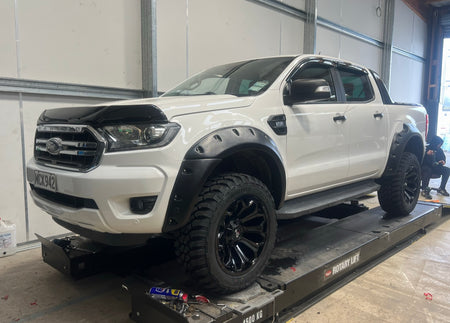 BONNET GUARD THICK 2012-2021- RANGER/EVEREST installed on white Ute from right zoomed out in shop